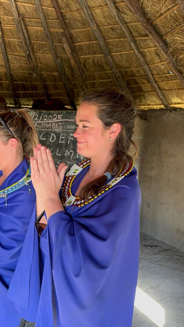 Reed Safari guest taking part in a meaningful Tanzanian cultural visit