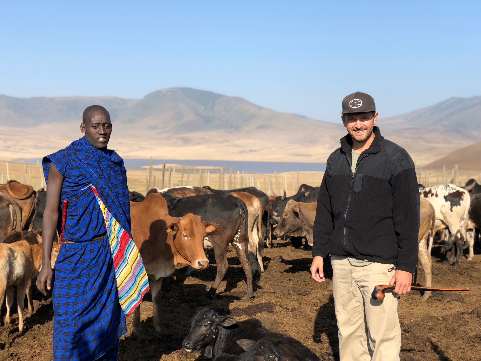 Reed Safari guest visiting a Maasai community in Tanzania